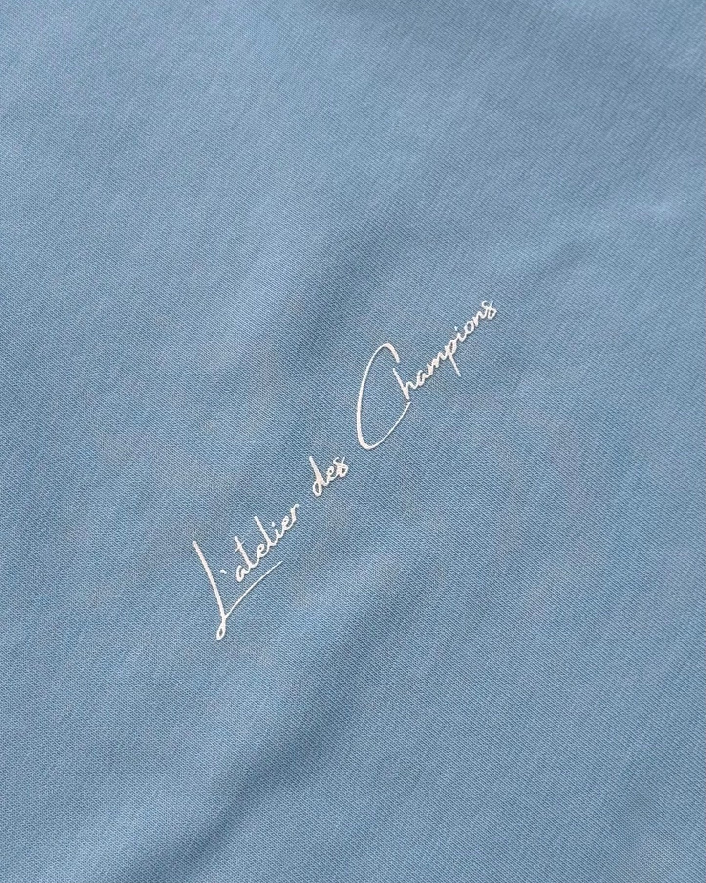 Champions Oversized Tee – Baby Blue